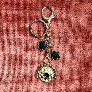 GEOMETRIC BAG CHARM Black and Gold Tone